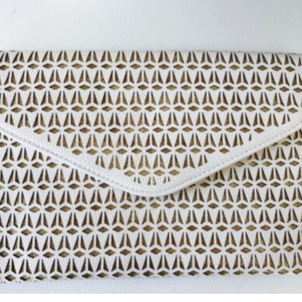 Francesca's Collection White Perforated Clutch